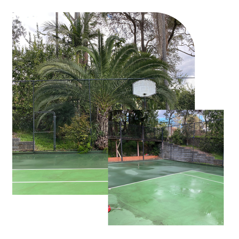 Clean tennis court after professional pressure cleaning surrounded by trees.